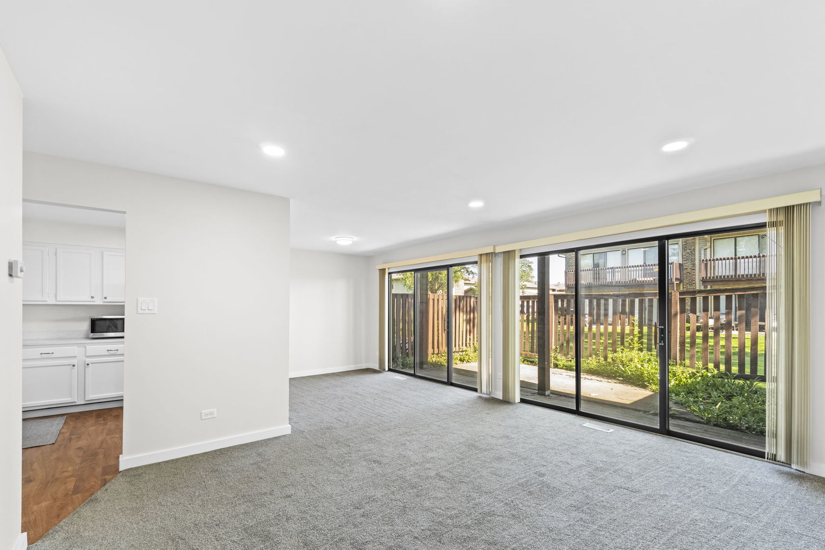 5880 Rembrandt Court, Unit C Hanover Park, IL 60133 - Photo 20 of 22 an empty room with windows
