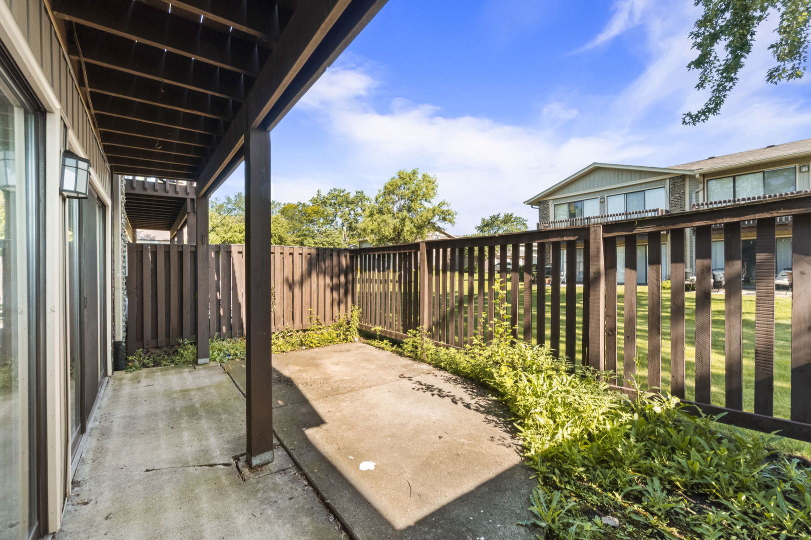 5880 Rembrandt Court, Unit C Hanover Park, IL 60133 - Photo 3 of 22 a view of a swimming pool with a patio