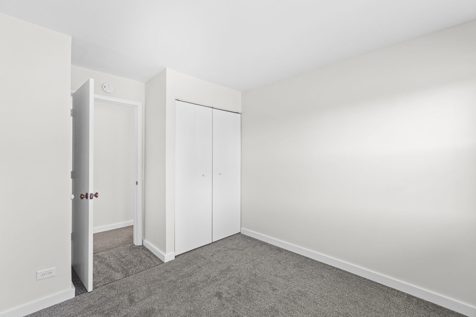 5880 Rembrandt Court, Unit C Hanover Park, IL 60133 - Photo 5 of 22 a view of an empty room