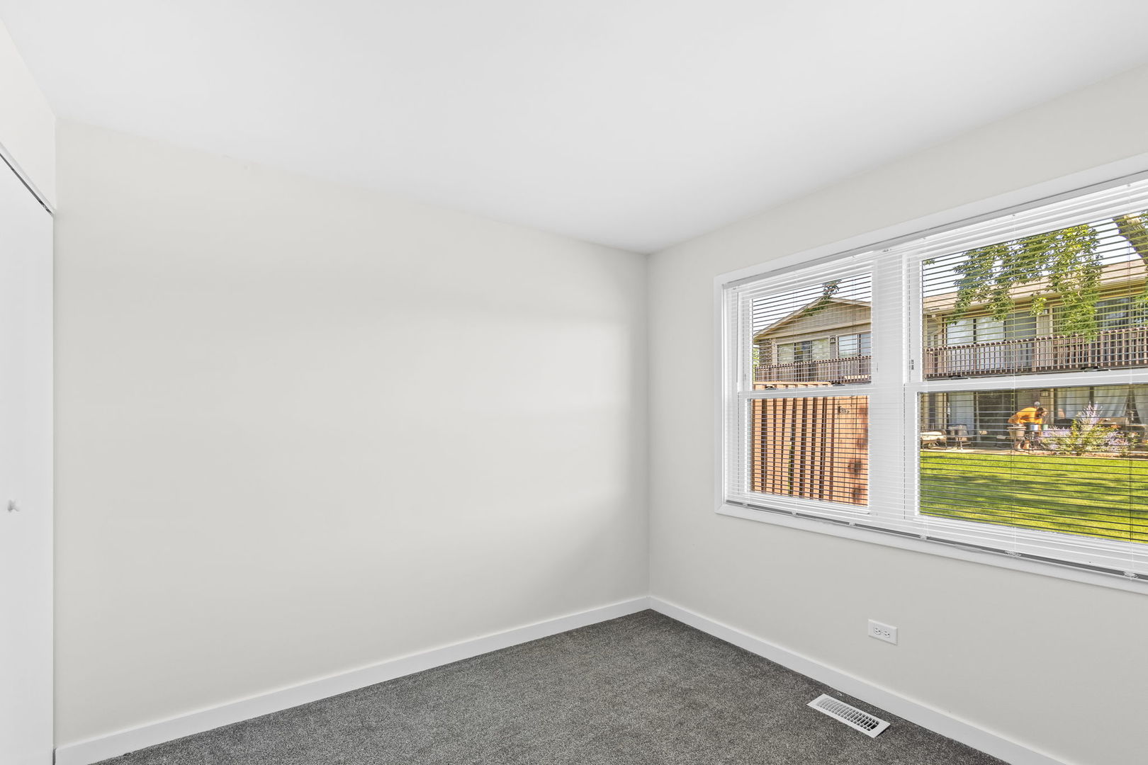 5880 Rembrandt Court, Unit C Hanover Park, IL 60133 - Photo 6 of 22 an empty room with a window
