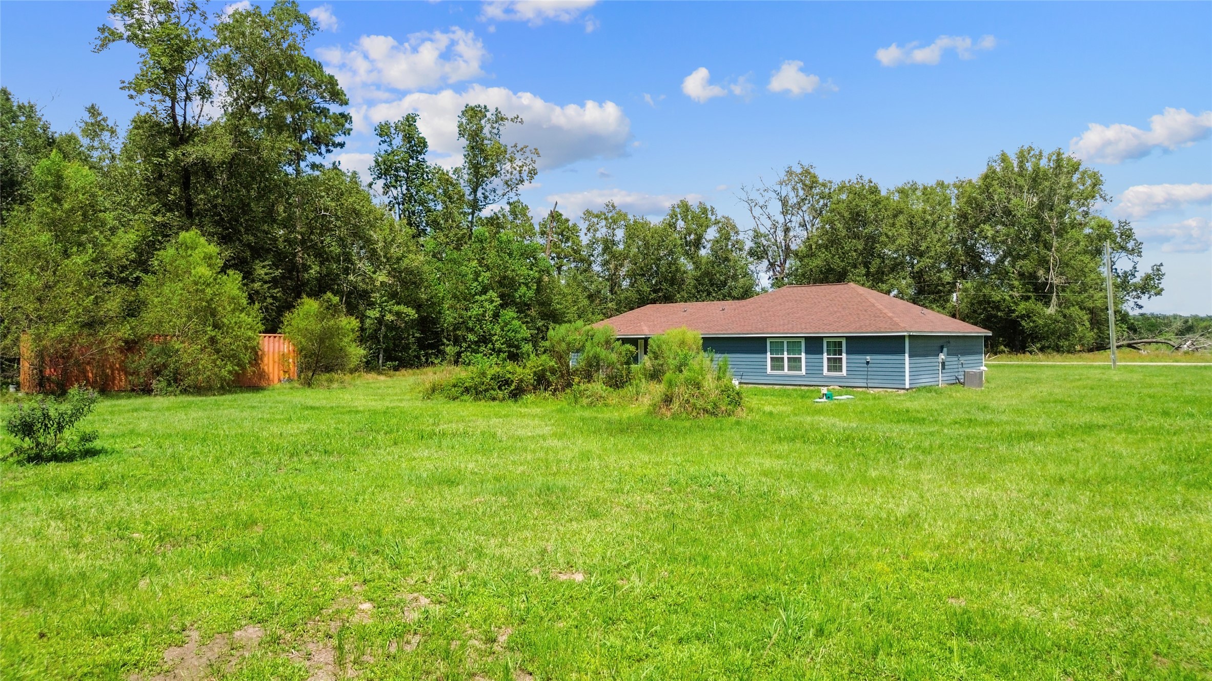 1545 County Road 2145 Cleveland, TX 77327 - Photo 19 of 22 a view of a garden