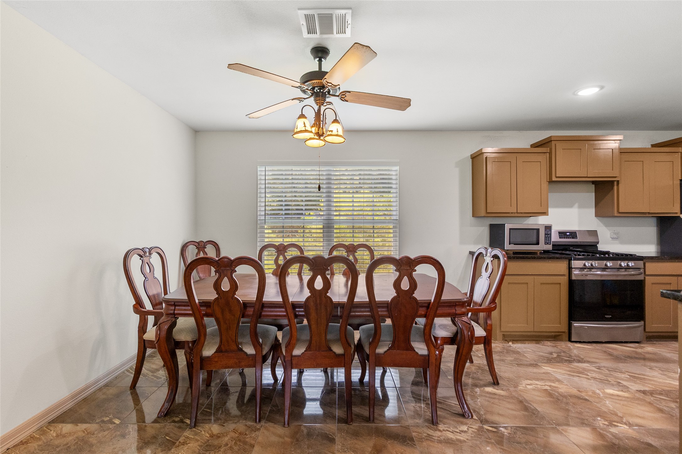 1545 County Road 2145 Cleveland, TX 77327 - Photo 8 of 22 a view of a dining room with furniture