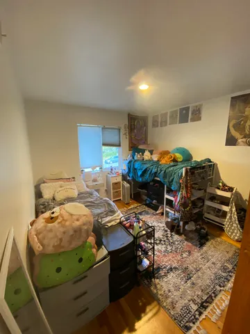 a room with gym equipment and a table