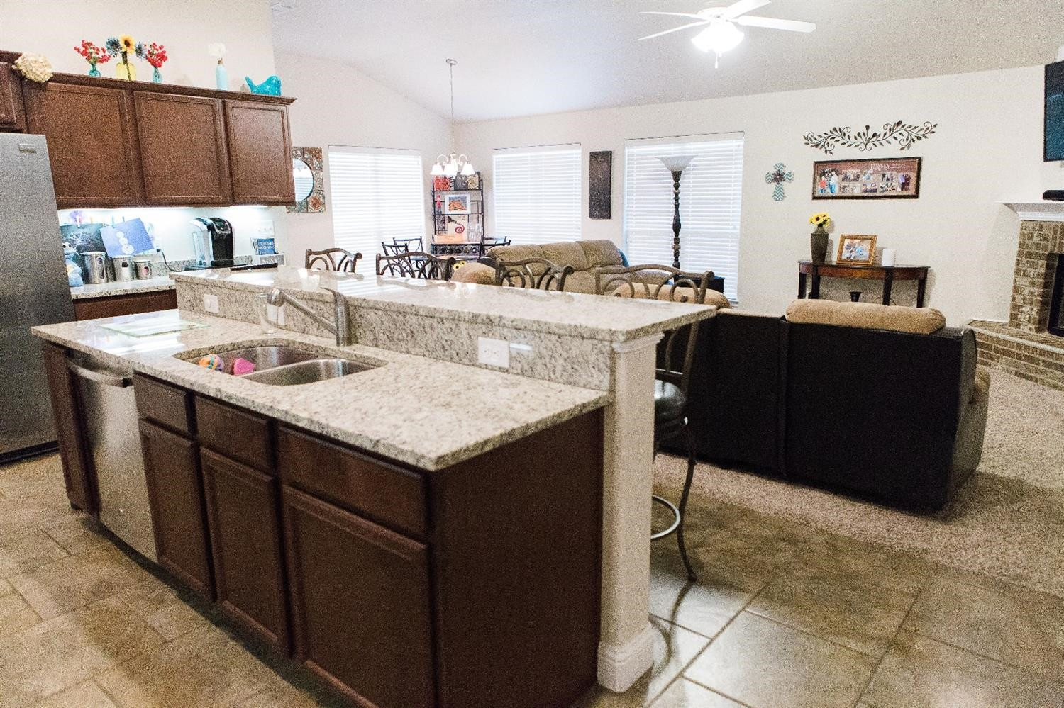 9204 Rochester Avenue Lubbock, TX 79424 - Photo 8 of 10 a kitchen with a cabinets and appliances