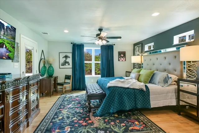 a living room with a sink and a mirror