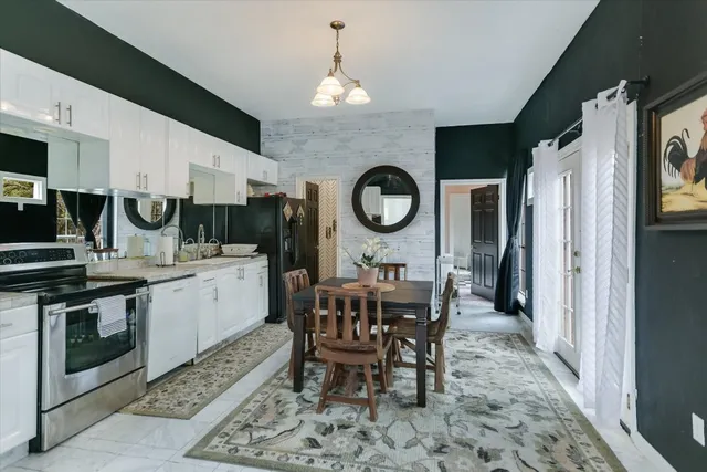 a view of a living room and dining room