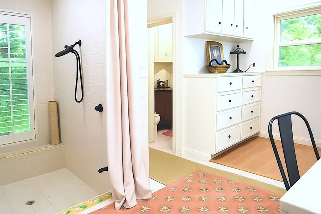 a view of a balcony with furniture