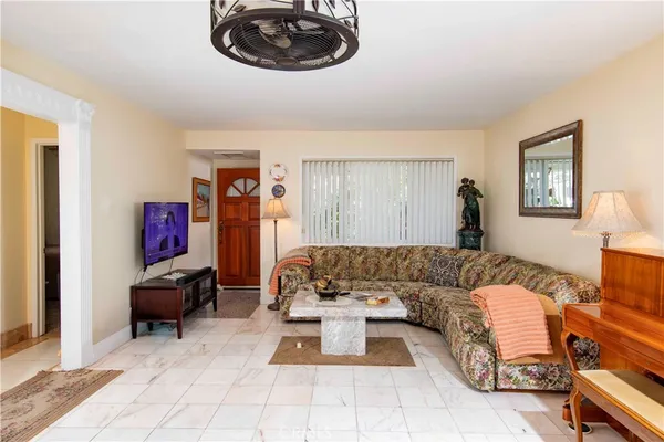 a living room with furniture and a couch