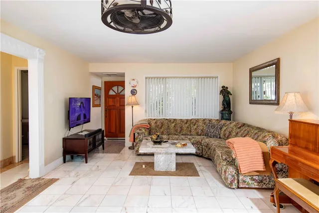 a living room with furniture and a couch