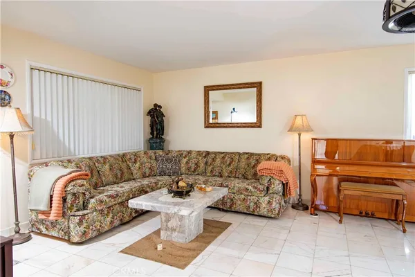 a living room with furniture and a couch