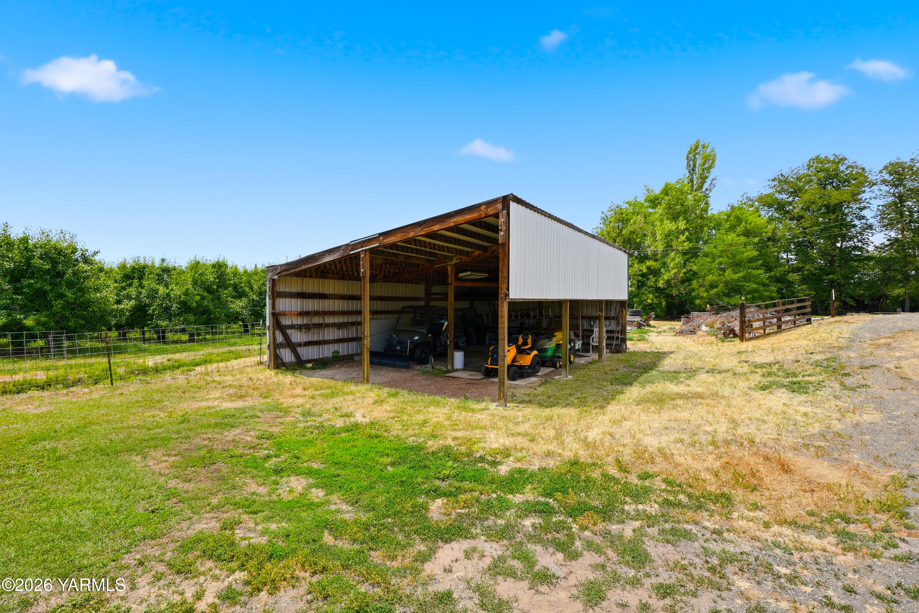 690 North Gleed Road Naches, WA 98937 - Photo 33 of 60 a view of a house with a yard