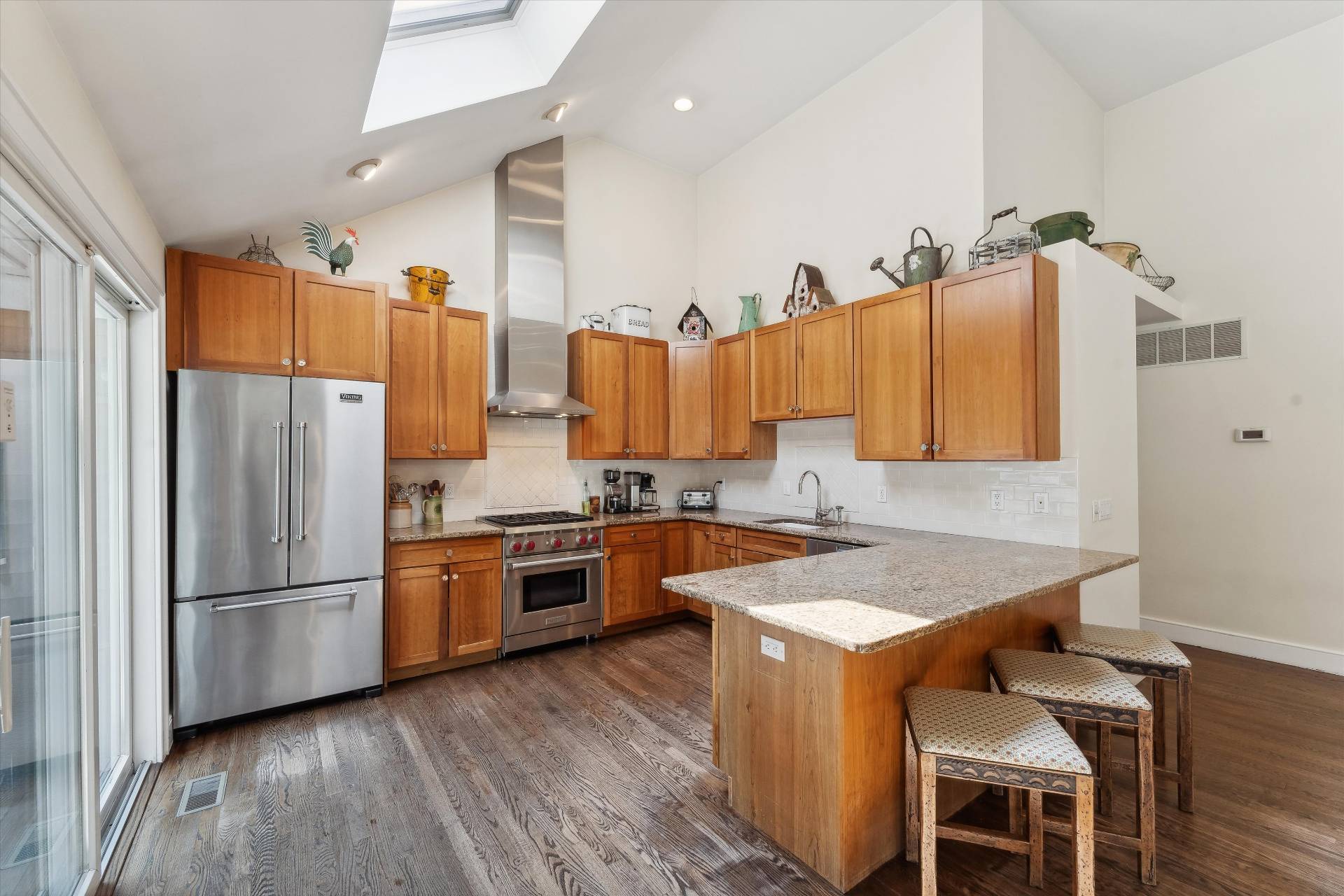 18 Old Fields Lane Quogue, NY 11959 - Photo 13 of 34 a kitchen with a refrigerator and a sink