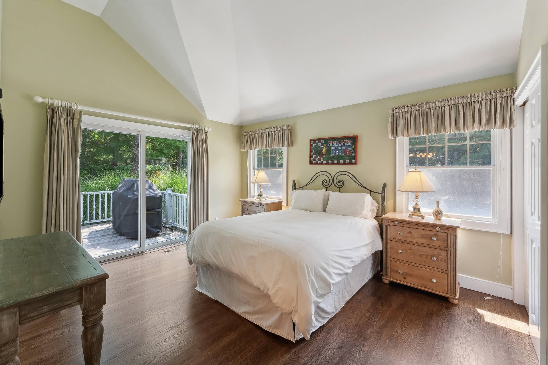 18 Old Fields Lane Quogue, NY 11959 - Photo 18 of 34 a bedroom with a bed and wooden floor