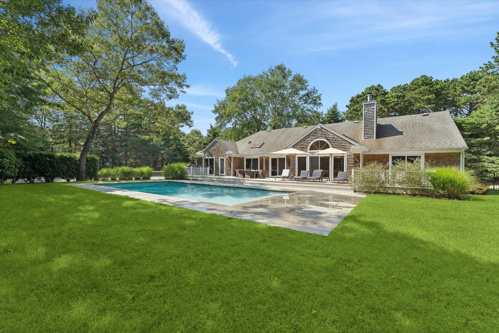 18 Old Fields Lane Quogue, NY 11959 - Photo 3 of 34 a view of house with a big yard