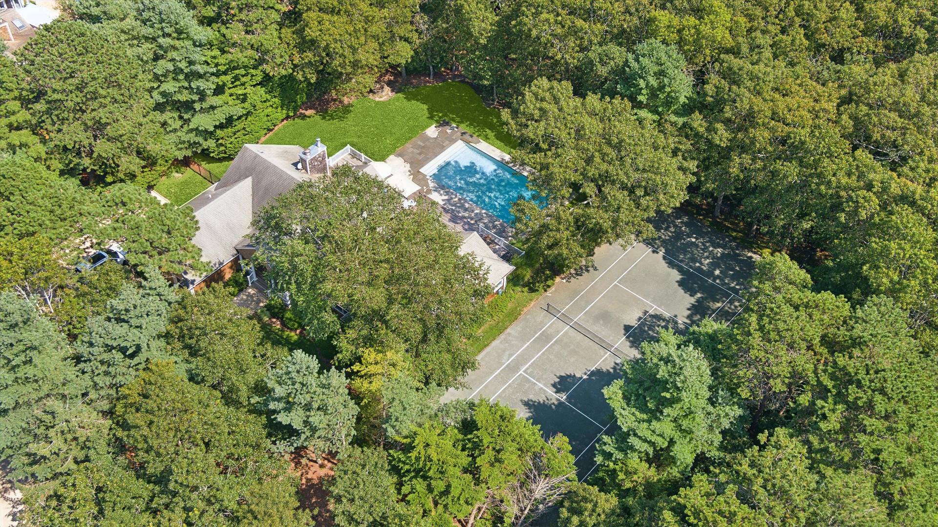 18 Old Fields Lane Quogue, NY 11959 - Photo 32 of 34 an aerial view of a house with a yard
