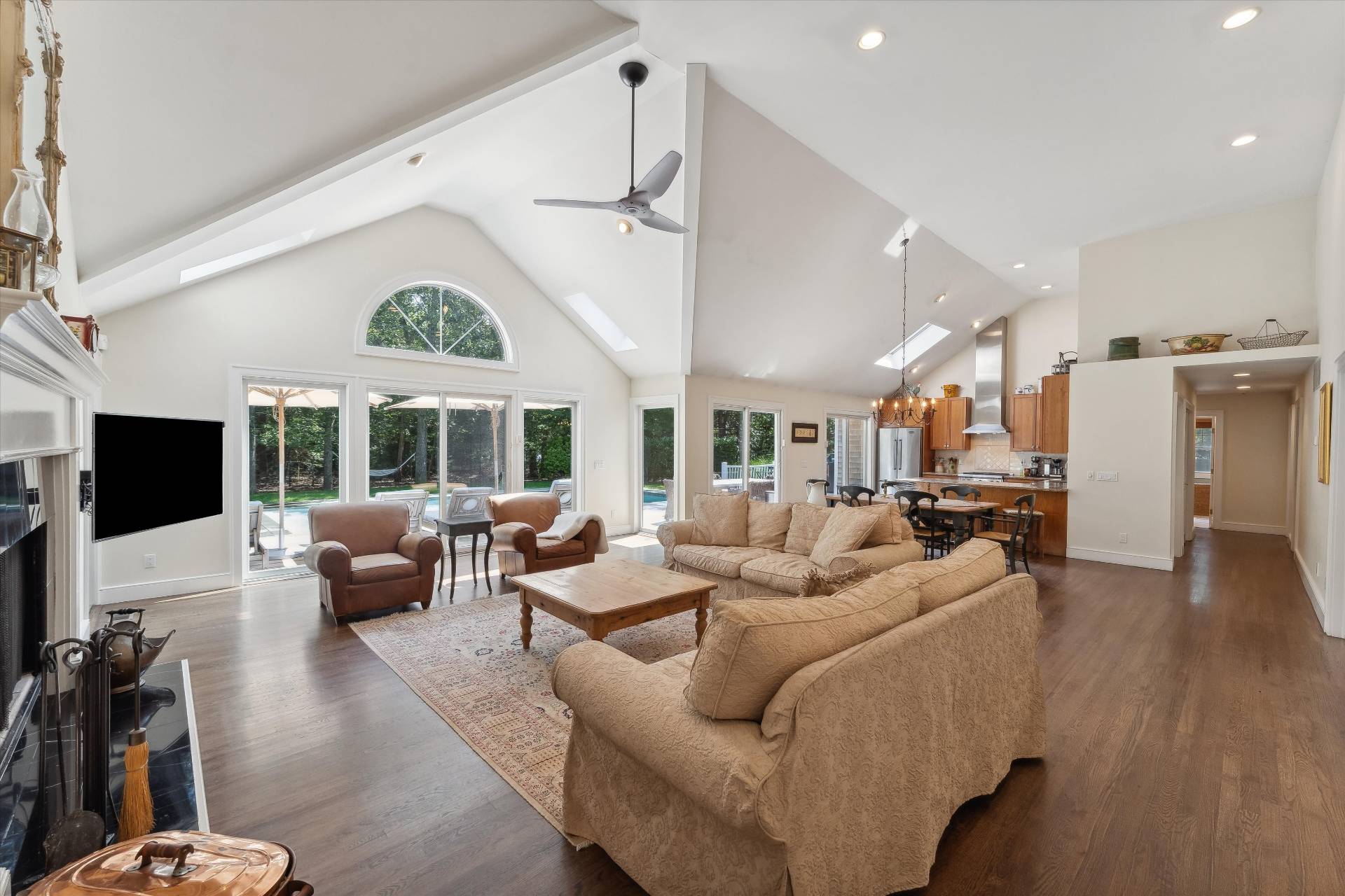 18 Old Fields Lane Quogue, NY 11959 - Photo 7 of 34 a living room with furniture and a large window