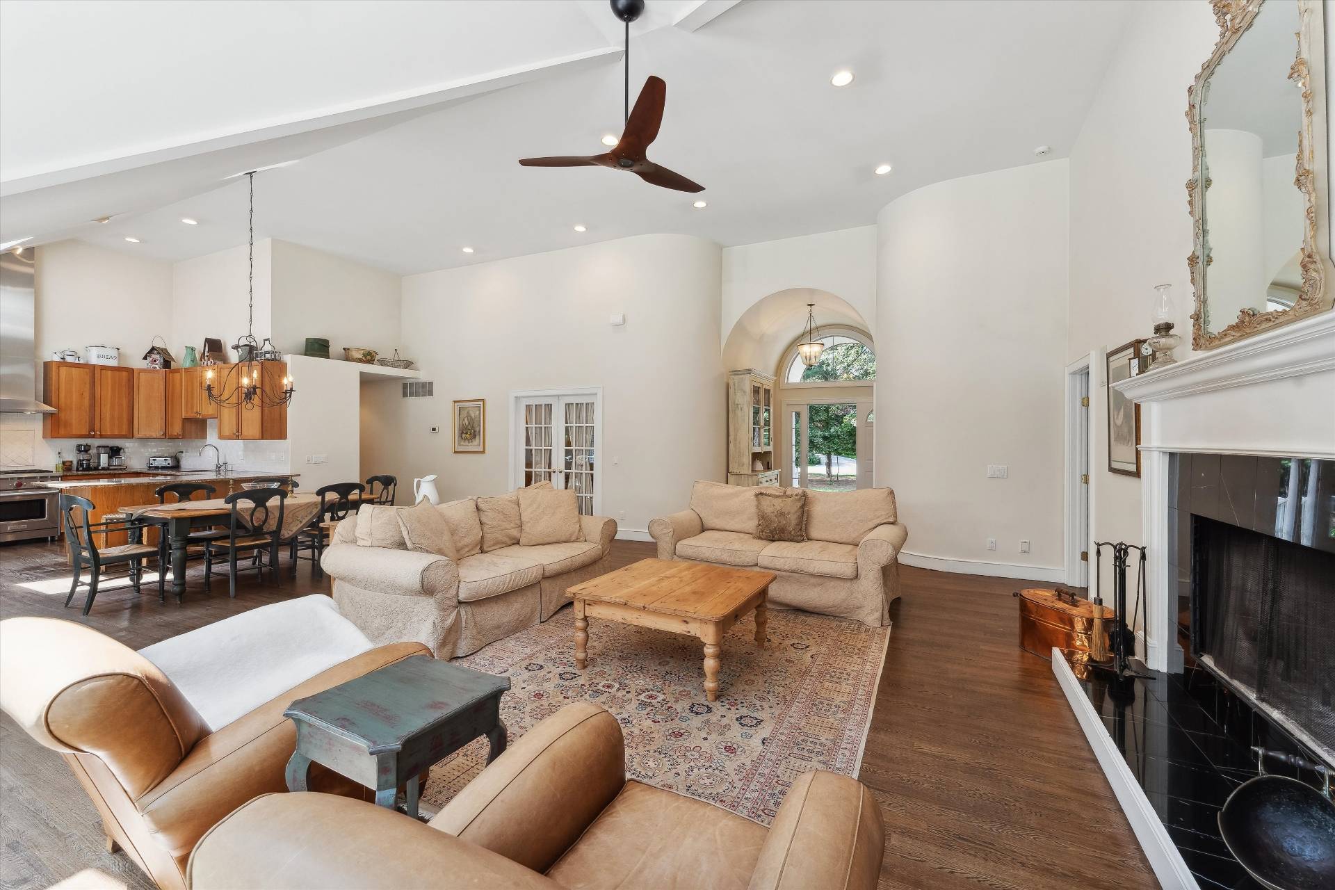 18 Old Fields Lane Quogue, NY 11959 - Photo 8 of 34 a living room with furniture or couch and a fireplace