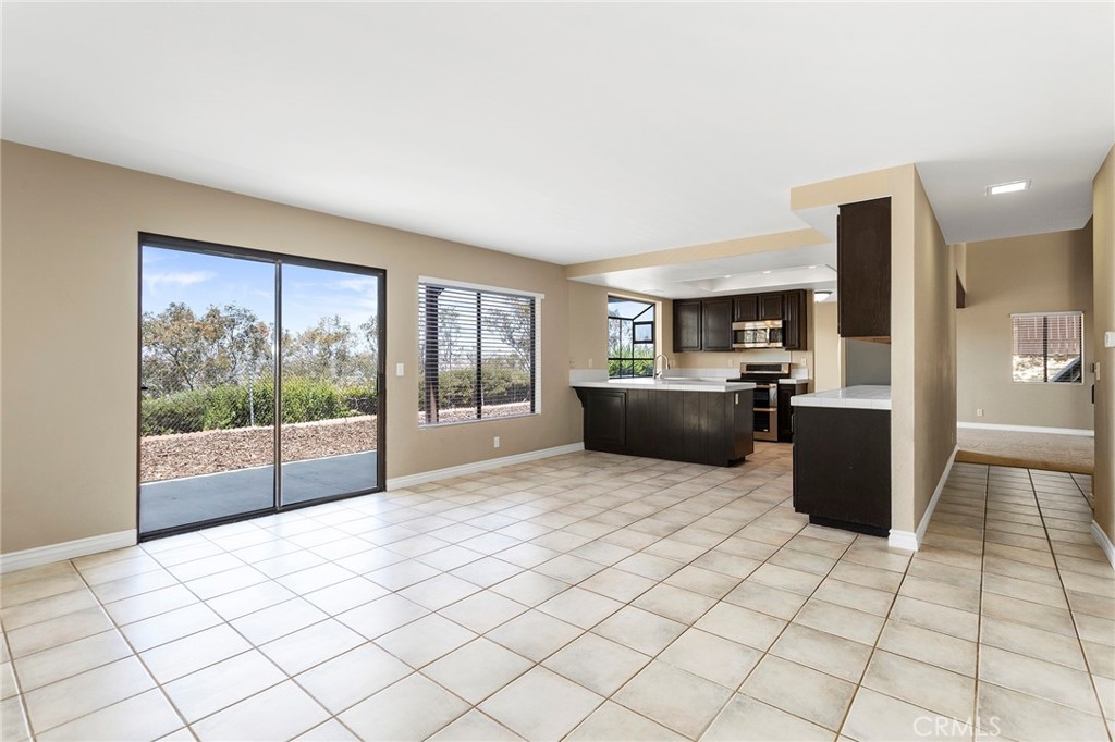 2881 Todd Street Oceanside, CA 92054 - Photo 14 of 41 a large bedroom with a bed and glass door