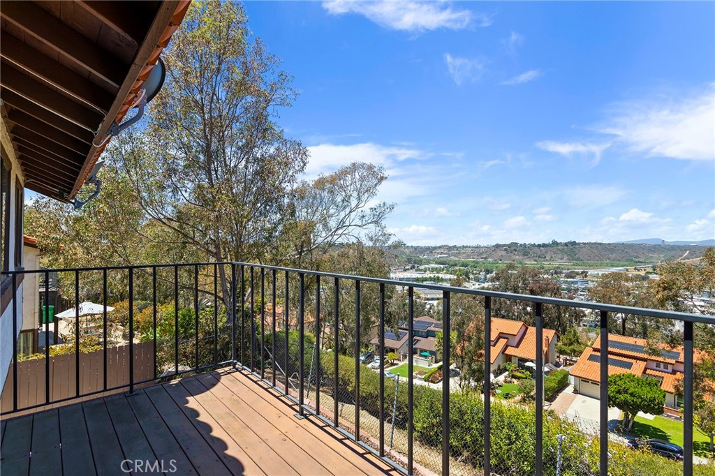2881 Todd Street Oceanside, CA 92054 - Photo 24 of 41 a view of a balcony with wooden floor and fence