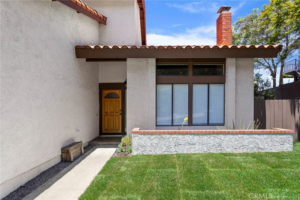 2881 Todd Street Oceanside, CA 92054 - Photo 4 of 41 a front view of a house with a yard