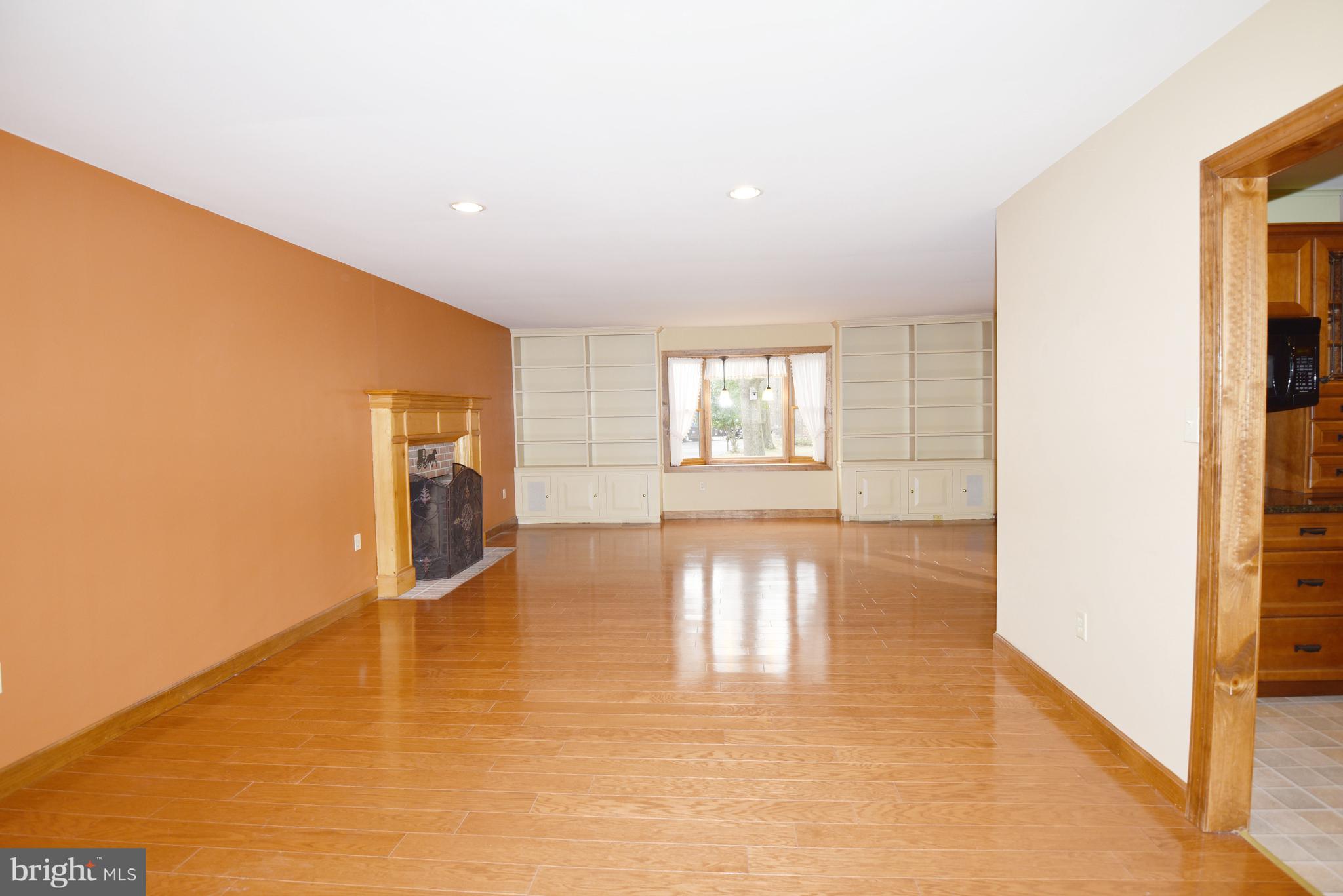 933 Woods Road Bear, DE 19701 - Photo 7 of 27 Adjoing dining area & hardwood flooring