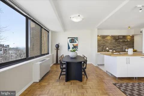a living room with furniture and window