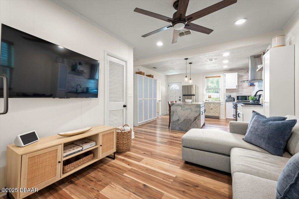 2057 Huntsford Road Jacksonville, FL 32207 - Photo 11 of 30 a living room with furniture and a flat screen tv