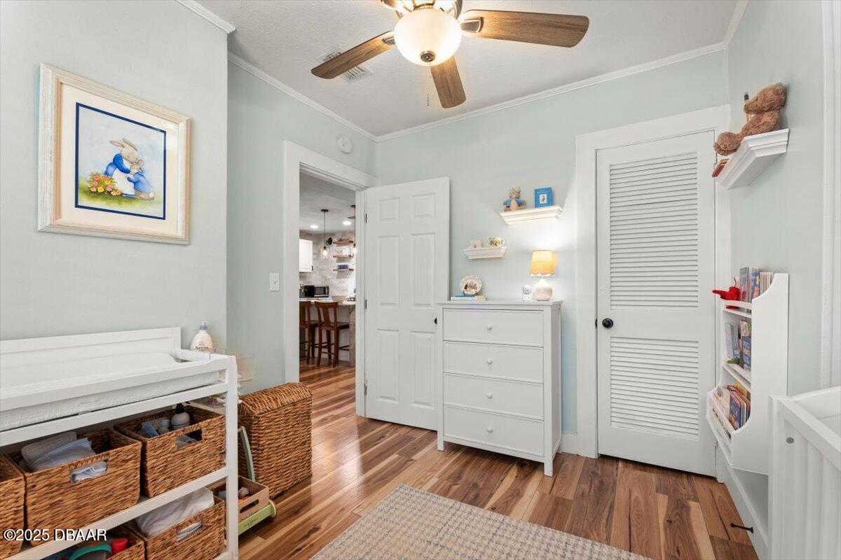 2057 Huntsford Road Jacksonville, FL 32207 - Photo 15 of 30 a hallway view with furniture and wooden floor