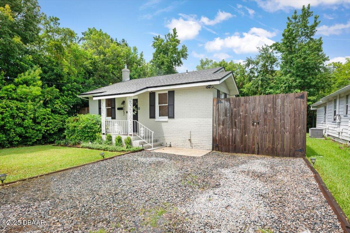 2057 Huntsford Road Jacksonville, FL 32207 - Photo 24 of 30 a front view of a house with garden