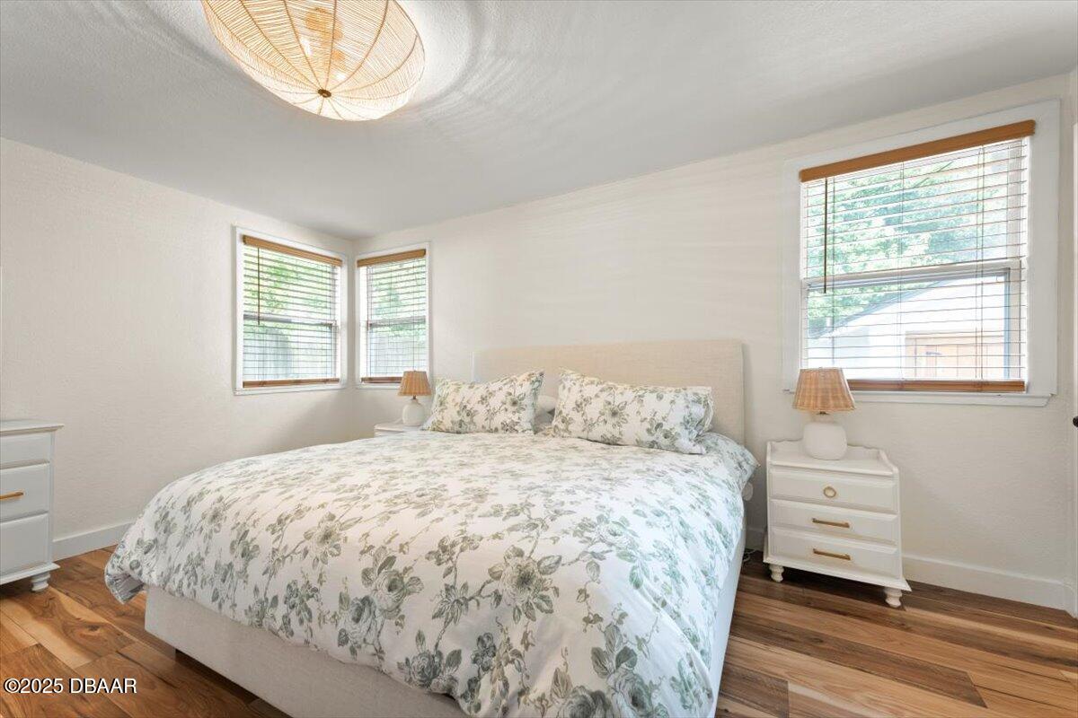 2057 Huntsford Road Jacksonville, FL 32207 - Photo 28 of 30 a bedroom with a bed and a window