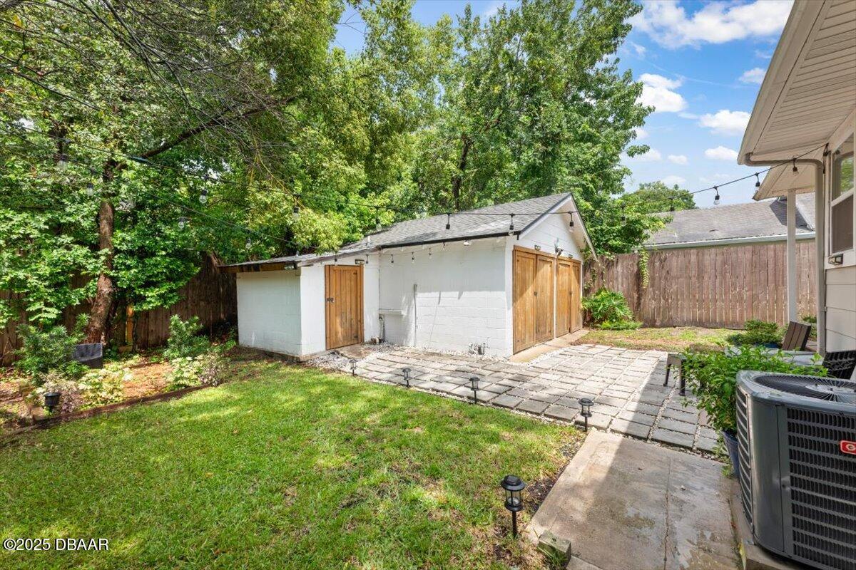 2057 Huntsford Road Jacksonville, FL 32207 - Photo 29 of 30 front view of house with a yard
