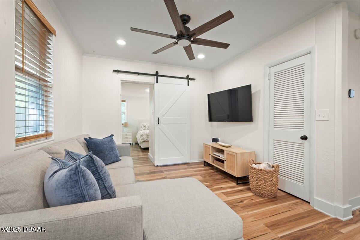 2057 Huntsford Road Jacksonville, FL 32207 - Photo 10 of 30 a living room with furniture and a flat screen tv