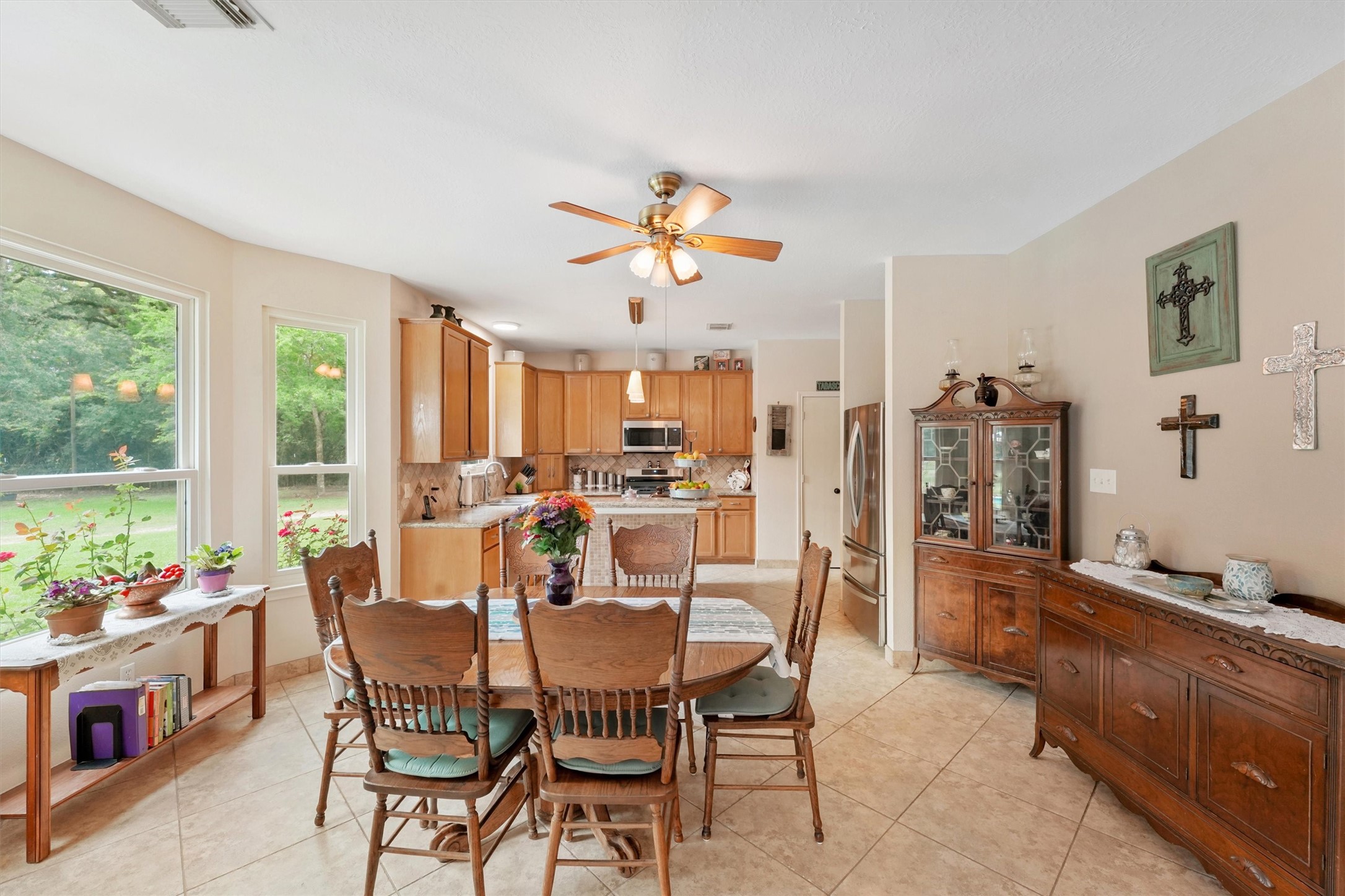 6803 Treaschwig Road Spring, TX 77373 - Photo 8 of 22 a view of a dining room with furniture window and outside view