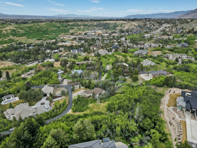 10667 Hidden Ridge Lane Sandy, UT 84092 - Photo 17 of 21 Aerial perspective of suburban area featuring mountains