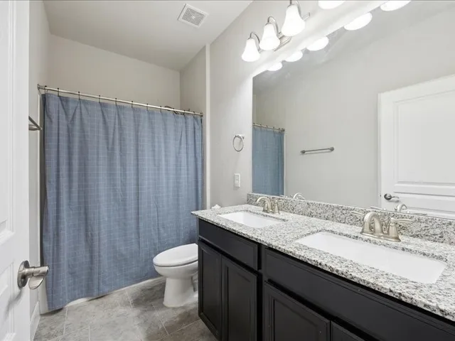 wooden floor with white walls