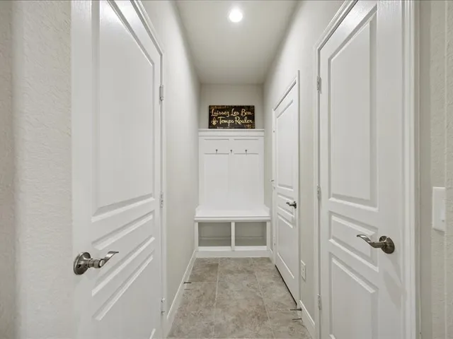 a kitchen with a stove and a microwave