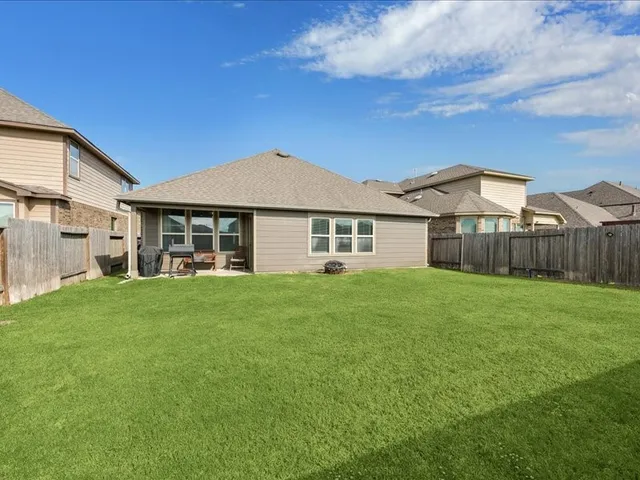 a view of a porch with furniture