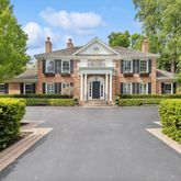 front view of a house with a small yard