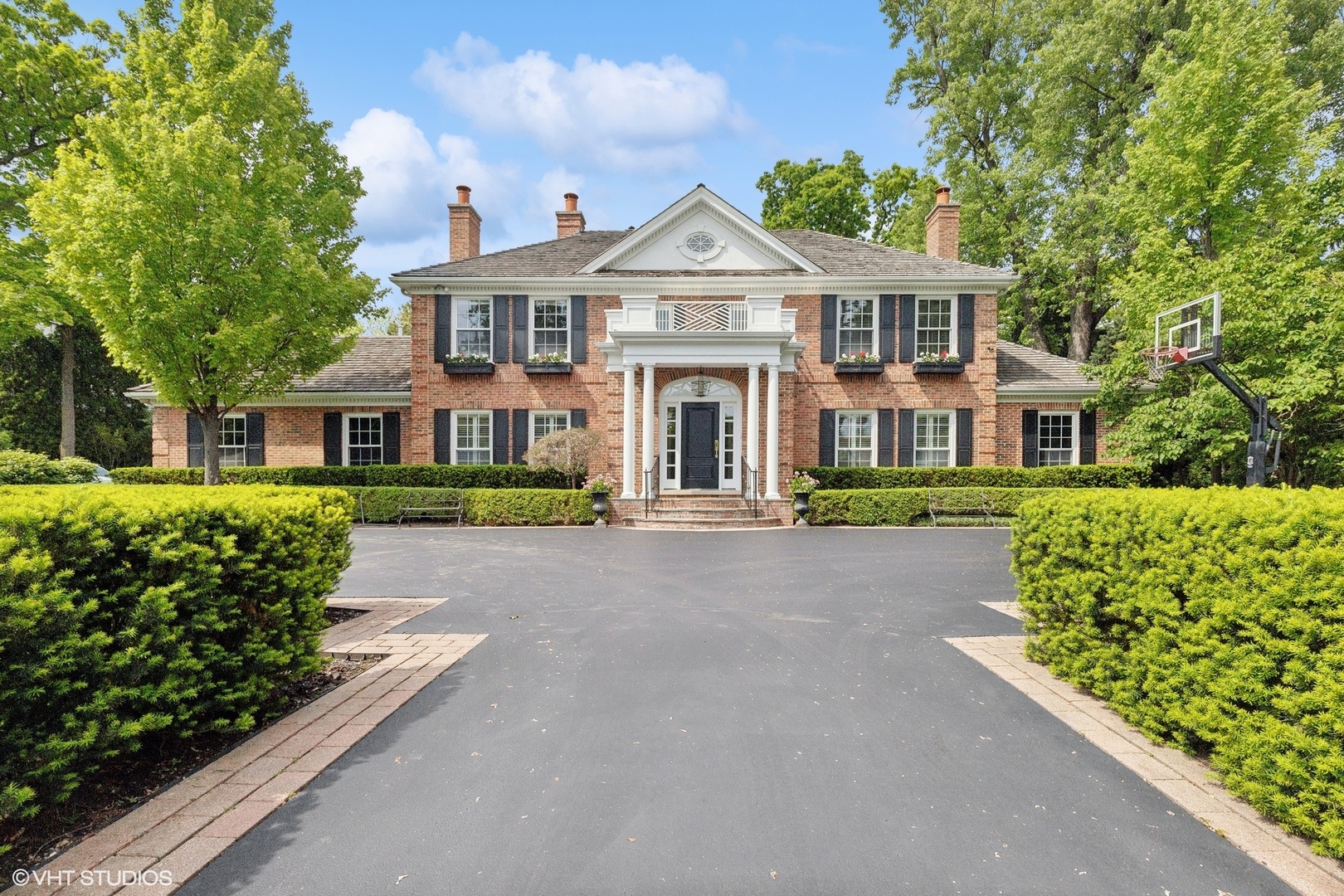 front view of a house with a small yard