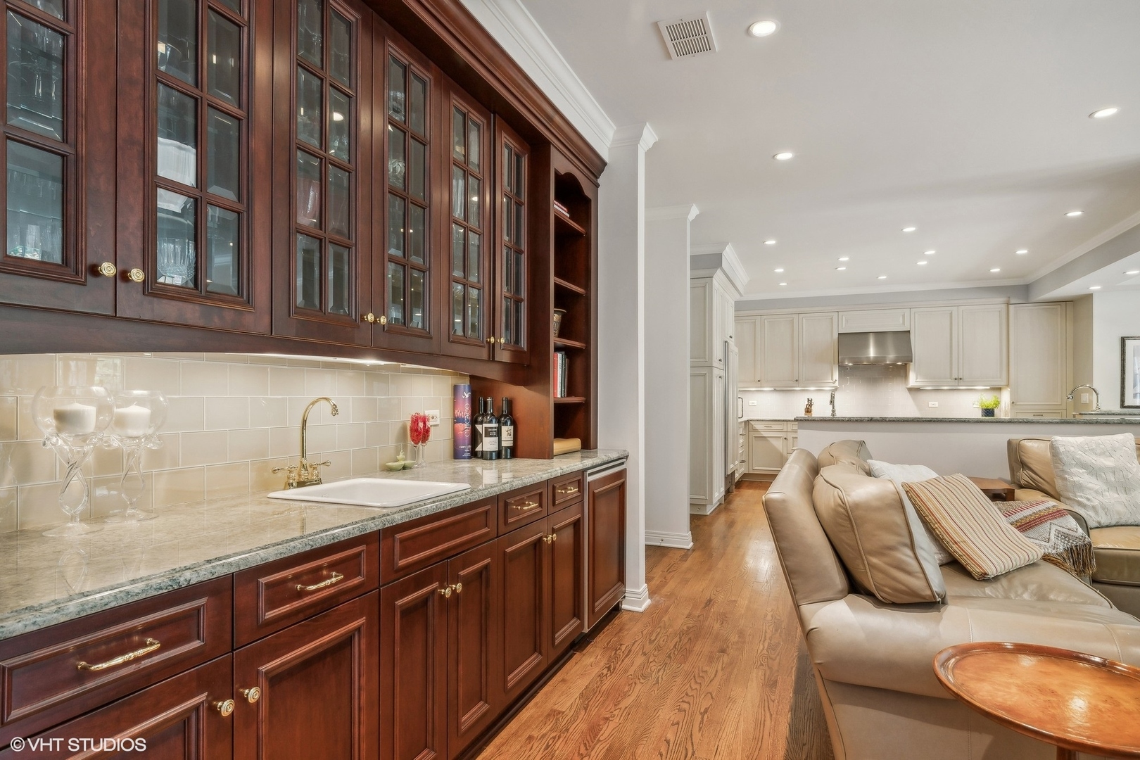 650 East Deerpath Road Lake Forest, IL 60045 - Photo 12 of 45 a kitchen with stainless steel appliances granite countertop lots of counter top space and wooden floor