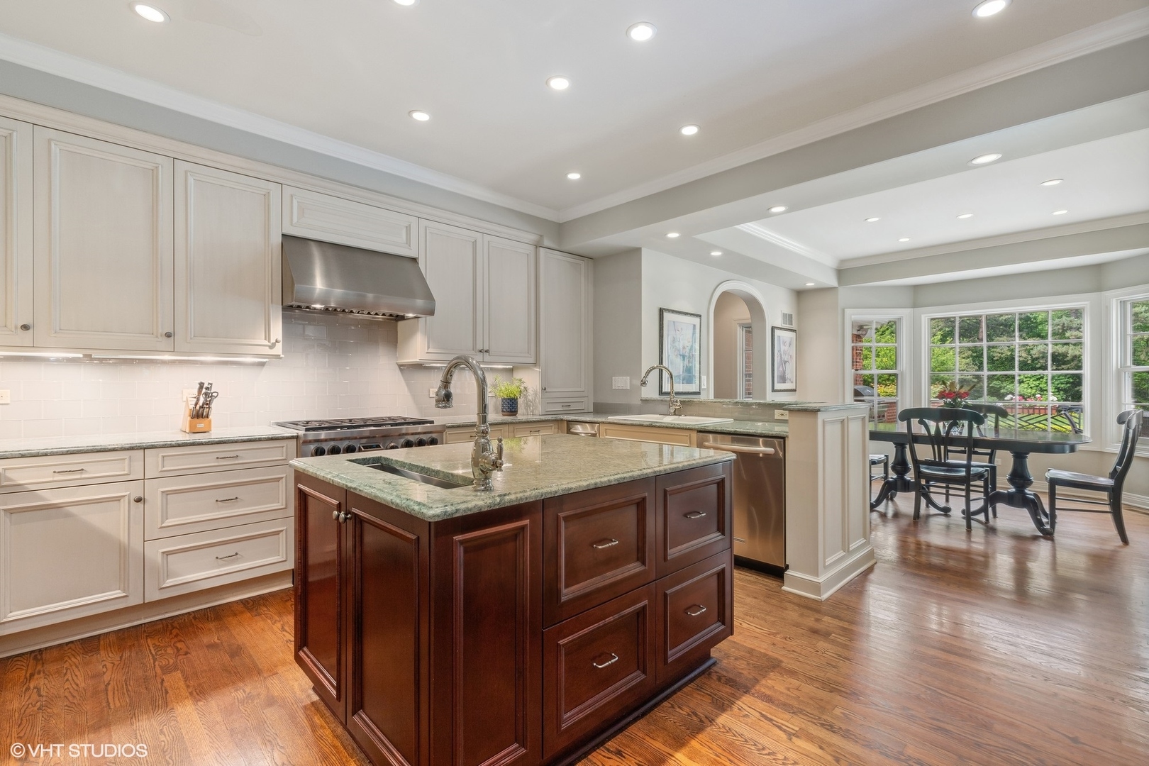 650 East Deerpath Road Lake Forest, IL 60045 - Photo 16 of 45 a kitchen with a stove and a sink