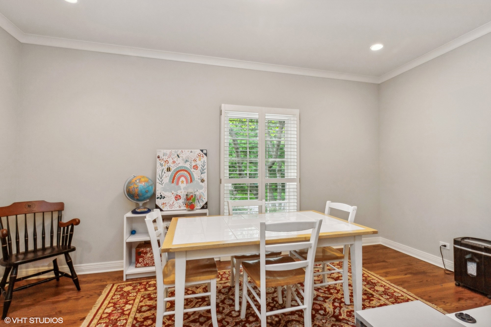 650 East Deerpath Road Lake Forest, IL 60045 - Photo 18 of 45 a view of a dining room with furniture and wooden floor