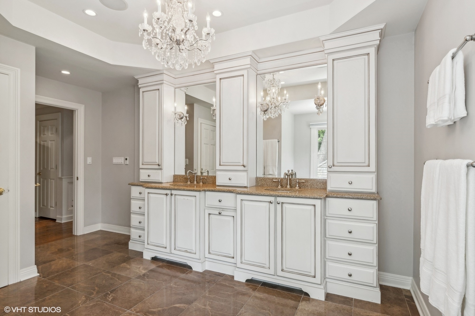 650 East Deerpath Road Lake Forest, IL 60045 - Photo 22 of 45 a large bathroom with a double vanity sink and a mirror