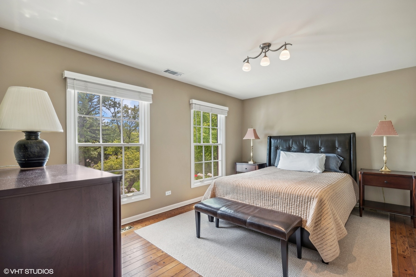 650 East Deerpath Road Lake Forest, IL 60045 - Photo 24 of 45 a bedroom with a bed and a large window