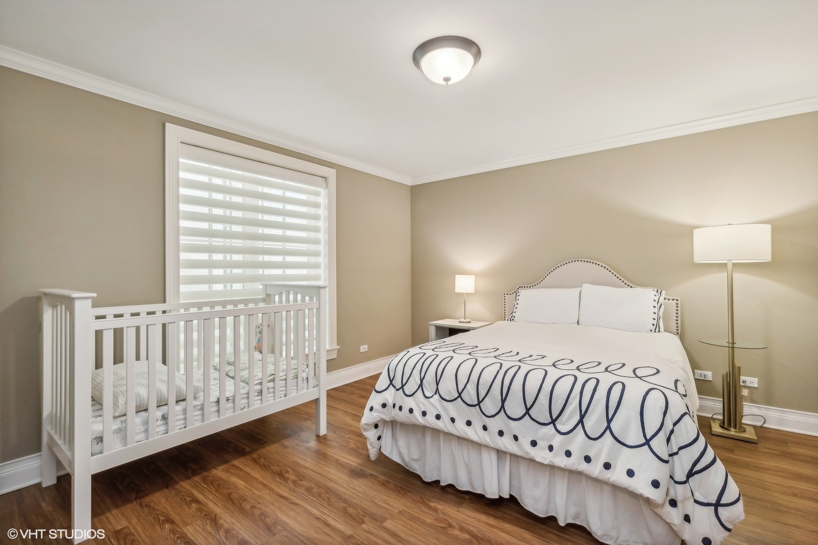 650 East Deerpath Road Lake Forest, IL 60045 - Photo 29 of 45 a bedroom with a bed and a window