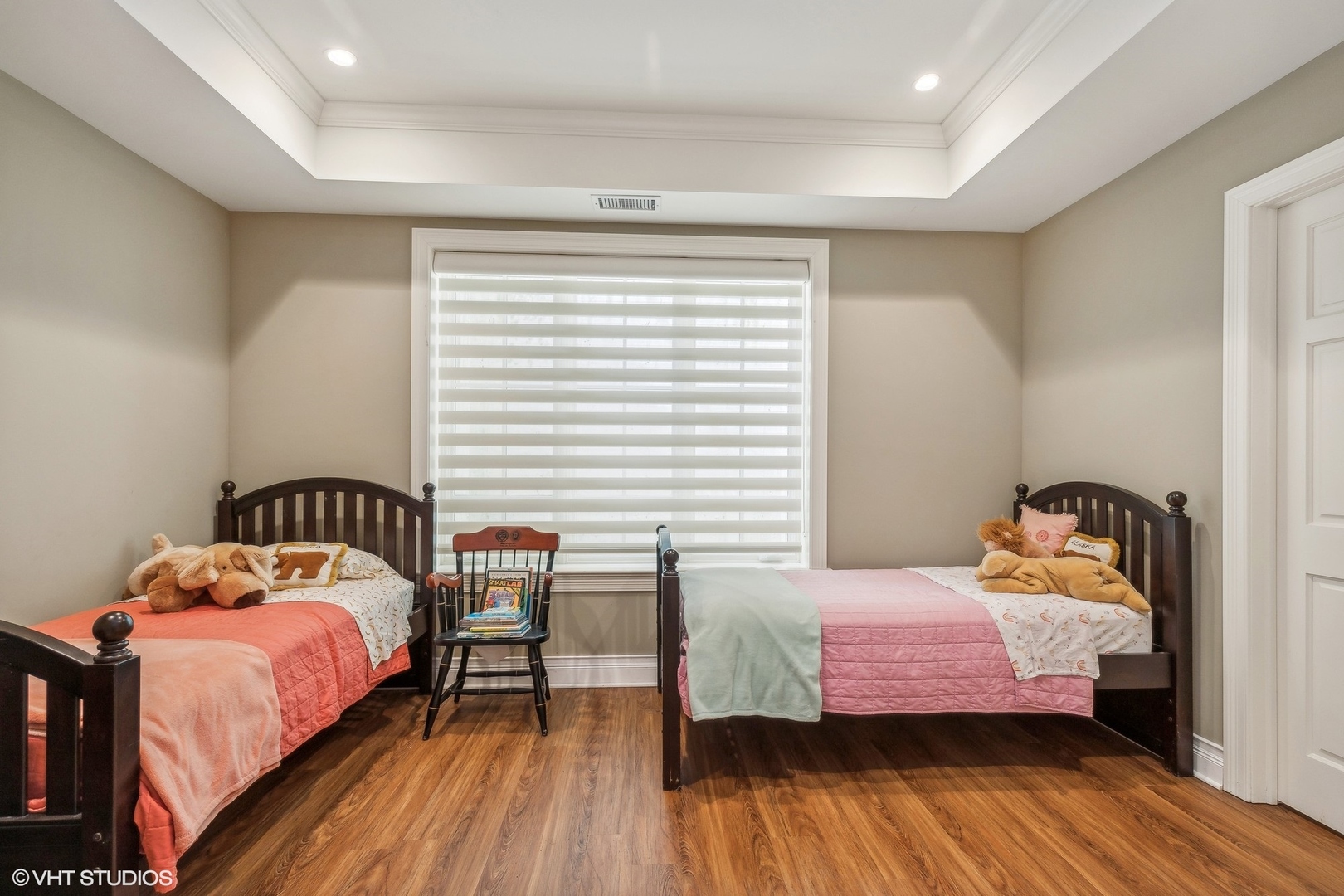 650 East Deerpath Road Lake Forest, IL 60045 - Photo 30 of 45 a bedroom with a bed and wooden floor