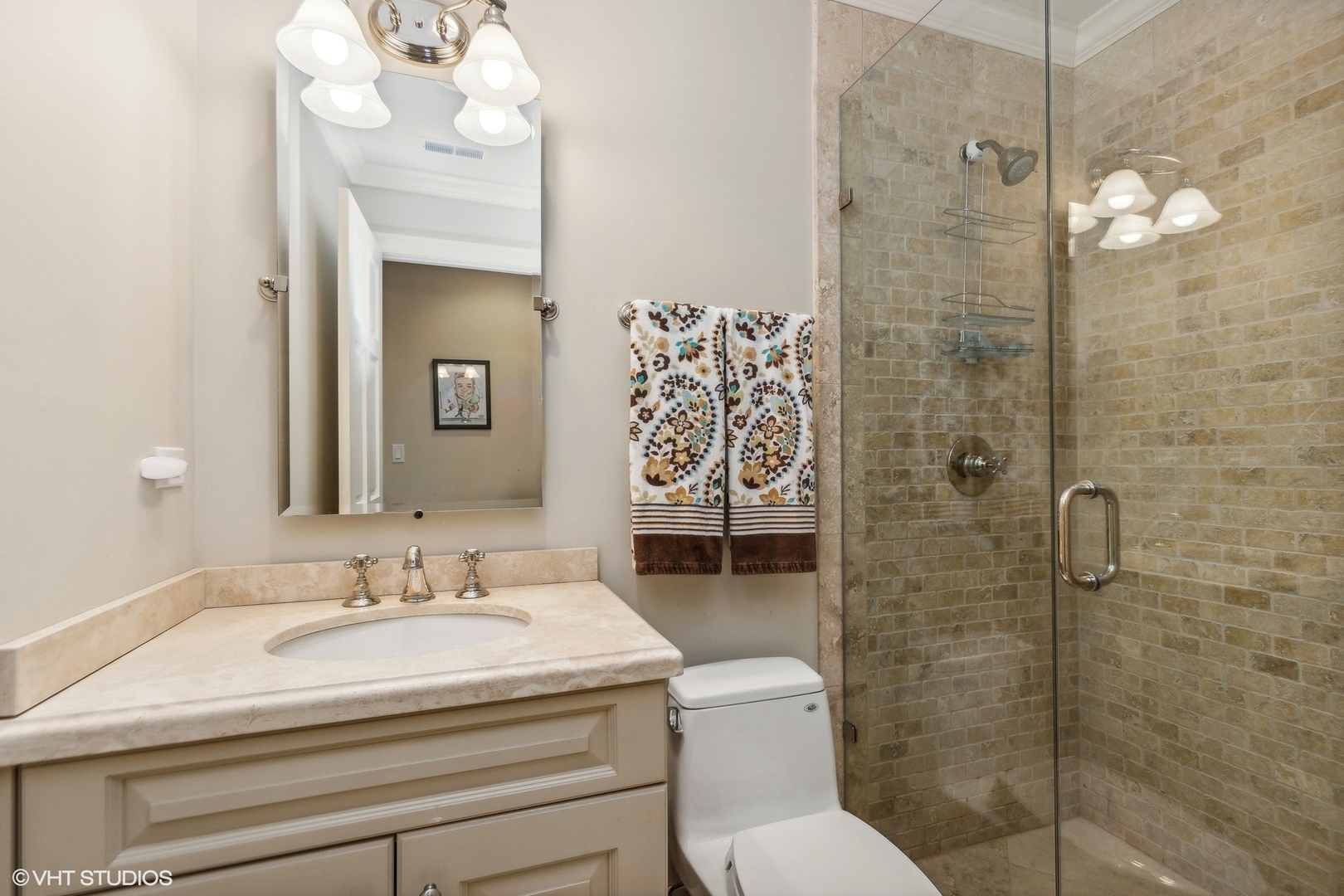 650 East Deerpath Road Lake Forest, IL 60045 - Photo 31 of 45 a bathroom with a sink a toilet a shower and a mirror