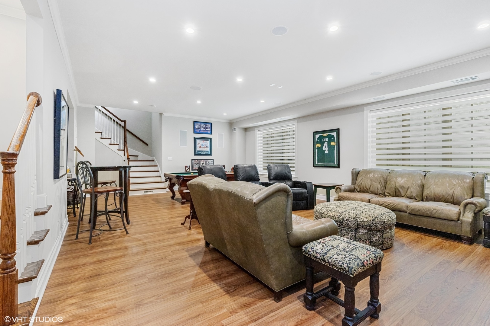 650 East Deerpath Road Lake Forest, IL 60045 - Photo 33 of 45 a living room with furniture kitchen view and a wooden floor