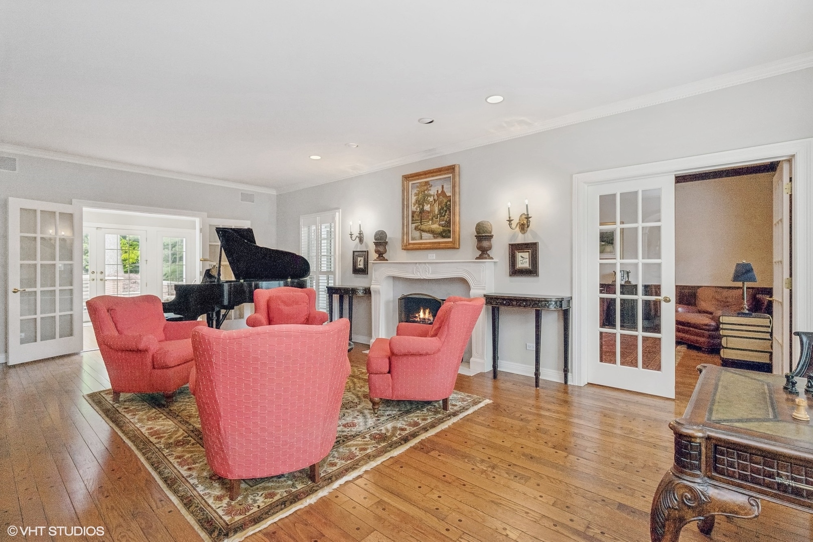 650 East Deerpath Road Lake Forest, IL 60045 - Photo 5 of 45 a living room with furniture a flat screen tv and a fireplace