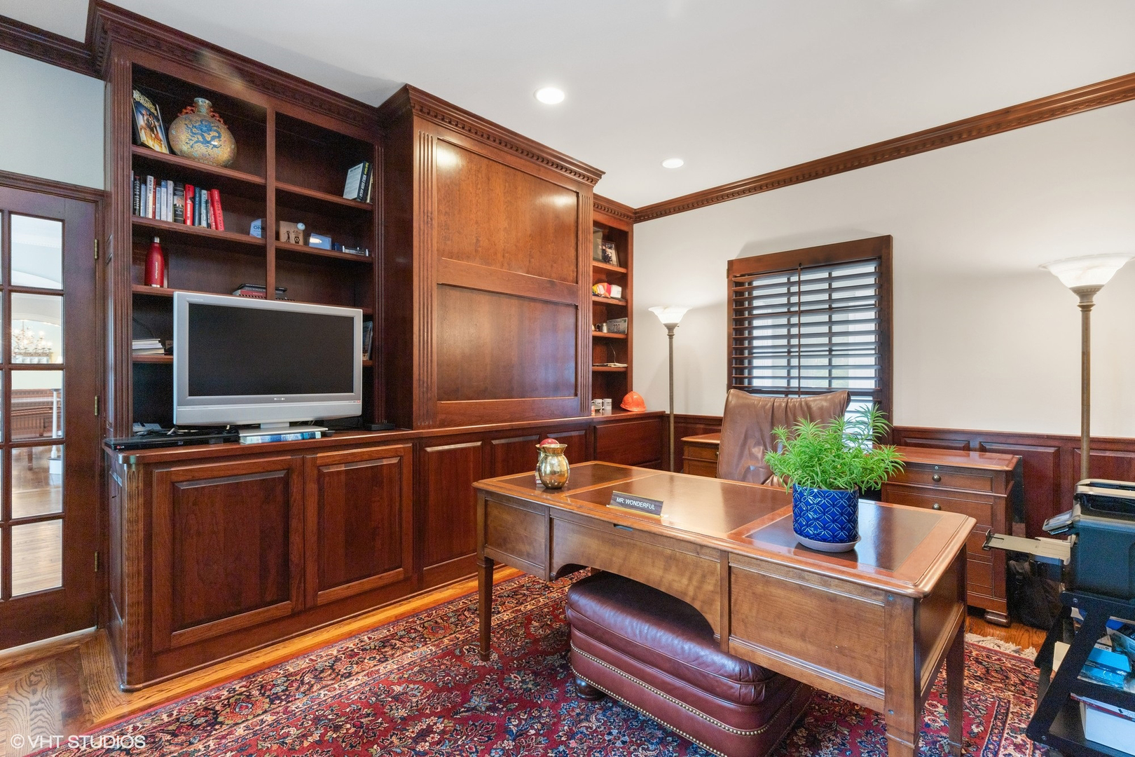 650 East Deerpath Road Lake Forest, IL 60045 - Photo 6 of 45 a living room with furniture and a flat screen tv